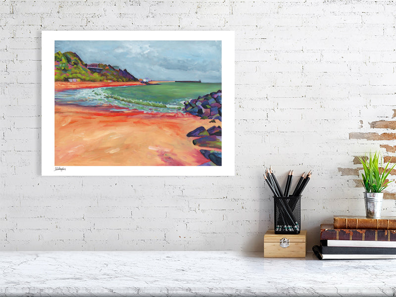 Wall art print of beach with colourful rocks